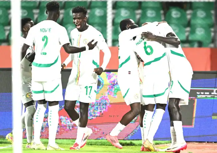 christian-gomis-of-senegal-celebrates-goal-with-team-players-during-the-2024-african-nations-championship-chan-football-match-between-senegal-and-nigeria-at-amaan-stadium-in-zanzibar السنغال تهزم نيجيريا بهدف في افتتاح "الشان" 2024